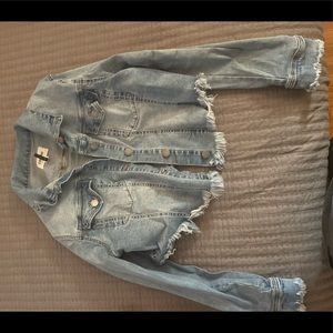 Cropped light wash distressed jean jacket